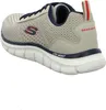 A side view of a beige Skechers sneaker. Voir les images du produit