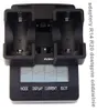 A black battery charger with two slots for batteries is shown against a white background. The charger has a digital display and buttons labeled 'MODE', 'DISPLAY', 'CURRENT', and 'SLOT'. Text is visible on the right side of the image. Anteprima dell’immagine prodotto