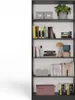 A tall, open bookshelf filled with books and decorative items. Voir les images du produit