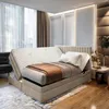 A bedroom scene featuring an adjustable bed with a mattress and bedding. Voir les images du produit