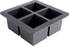 A dark gray silicone ice cube tray with four large square molds. Podgląd zdjęcia produktu