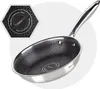 A stainless steel frying pan with a hexagonal non-stick surface is shown against a light gray and white background. A hexagonal inset in the top left corner displays text and a honeycomb pattern. Náhľad obrázku produktu