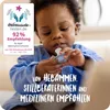 A baby holding a pacifier with a marketing overlay. Náhľad obrázku produktu