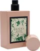 A bottle of Gucci Bloom Acqua di Fiori Eau de Toilette for women, with its cap placed next to it. Produktbild-Vorschau