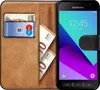 A brown leather wallet-style phone case with a Samsung phone inside, showing cards and euro banknotes. Anteprima dell’immagine prodotto