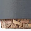 A close-up view of the bottom portion of a pendant lamp, showing the textured weave of the water hyacinth base and the fabric shade above. Produktbild-Vorschau