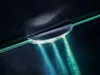Close-up of an illuminated edge of a display case with LED lighting. Produktbild-Vorschau
