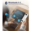 A person is using a smartphone and a tablet, with a white device that appears to be a portable CD player with a remote control. Produktbild-Vorschau