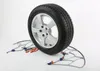 A car tire with snow chains around it, presented on a white background. Produktbild-Vorschau