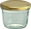 A clear glass jar with a golden lid, isolated on a white background. Produktbild-Vorschau