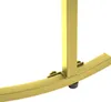 A close-up view of the base of a gold-colored table leg, showing its connection to the curved base. Náhled obrázku produktu