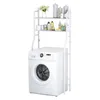 A white washing machine with a white shelf unit above it, stocked with various toiletries and decorative items. Produktbild-Vorschau