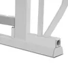 A close-up view of the base of a white baby gate, showing its construction and mounting point. Voir les images du produit