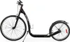 A black scooter with large wheels, a kickstand, and a water bottle holder, shown against a white background. Produktbild-Vorschau