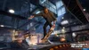 A skateboarder performing a trick in an indoor skatepark. Produktbild-Vorschau