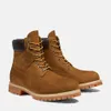 A pair of brown Timberland boots on a white background. Anteprima dell’immagine prodotto