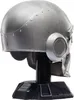 A silver helmet, likely a replica or toy, is displayed on a black stand against a white background. Anteprima dell’immagine prodotto