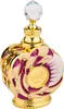 A close-up studio shot of a decorative perfume bottle. Voir les images du produit