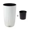 A white planter pot with a black inner pot and a plus sign. Voir les images du produit