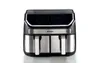 A studio shot of a black and silver dual-basket air fryer against a white background. Podgląd zdjęcia produktu