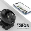 A black security camera is shown next to a smartphone displaying a list of recorded events. Náhled obrázku produktu
