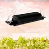 A black LED grow light is suspended above a row of green plants. Anteprima dell’immagine prodotto