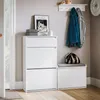 A hallway or entryway scene featuring white furniture, including a shoe cabinet and a bench with storage. Anteprima dell’immagine prodotto