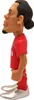 A figurine of a soccer player in a red jersey and silver shoes, shown from the side. Anteprima dell’immagine prodotto