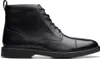 A black leather boot on a white background. Produktbild-Vorschau