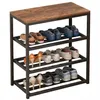 A shoe rack with multiple shelves filled with various shoes. Náhľad obrázku produktu