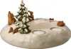 A ceramic advent wreath with winter-themed figurines and tea light holders. Anteprima dell’immagine prodotto