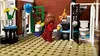A Lego scene depicting a pet shop interior with two minifigures, a cat, and various shop elements. Náhled obrázku produktu