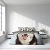 A bedroom with a bed featuring a husky-themed duvet cover and pillowcases. Produktbild-Vorschau