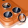 Close-up view of camera lens protectors on an orange phone. Anteprima dell’immagine prodotto