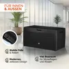 A black storage box is shown in a modern interior setting with plants and large windows. Anteprima dell’immagine prodotto