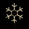 A lit snowflake decoration against a black background. Produktbild-Vorschau