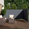 A patio scene with outdoor furniture and a retractable side awning. Anteprima dell’immagine prodotto