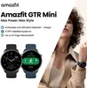A marketing image for the Amazfit GTR Mini smartwatch, featuring product shots and a lifestyle image of a woman wearing the watch. Podgląd zdjęcia produktu