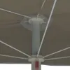 Close-up view of the internal mechanism of a sand-colored half umbrella. Náhled obrázku produktu