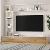 A modern TV wall unit with a TV, shelves, and storage cabinets, set in a living room. Náhľad obrázku produktu