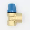 A brass valve with a blue cap against a white background. Náhľad obrázku produktu