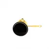 A top-down view of a gold and black coffee pot on a white background. Produktbild-Vorschau