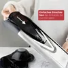 A person is demonstrating how to insert an attachment into a mandoline slicer. Produktbild-Vorschau