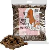 A bag of dog treats with some treats spilled in front of it. Produktbild-Vorschau