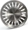 A close-up, top-down view of a stainless steel sink strainer with a brushed metal finish. Anteprima dell’immagine prodotto