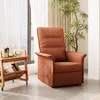 A recliner chair is placed next to a small wooden side table with books and glasses on it, near a window with sheer curtains and a potted plant. Produktbild-Vorschau