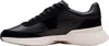 A side view of a black and white sneaker. Podgląd zdjęcia produktu