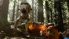 An AT-ST walker and an Ewok in a forest setting. Produktbild-Vorschau