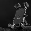 A black phone holder for a bicycle or motorcycle is shown against a dark, textured background. Anteprima dell’immagine prodotto