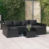 An outdoor patio setting with a black rattan lounge set and a coffee table. Náhled obrázku produktu